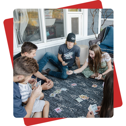 Landscape Photo of Kids Playing a Card Game on a Mat from Grandpa Beck's Games