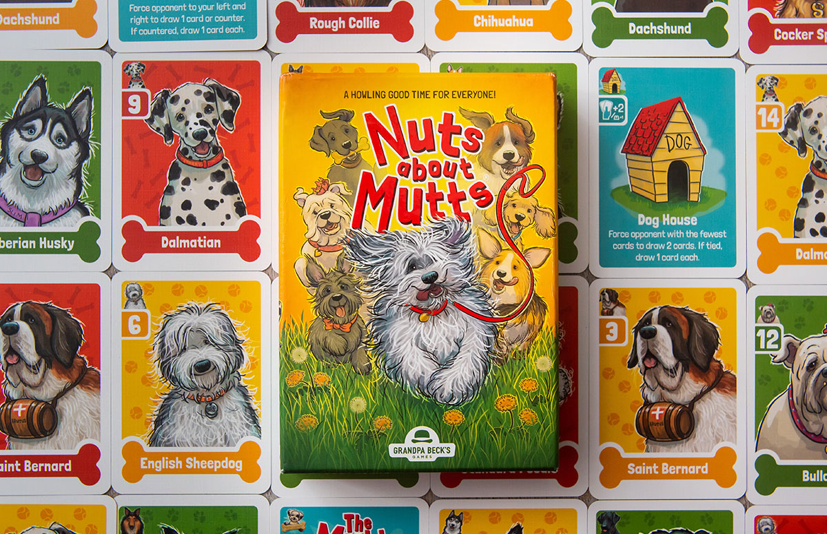 Portrait Photo with Contents of Board Game Representing Nuts about Mutts at Grandpa Beck's Games